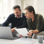 middle aged Newcastle couple looking at their estate planning