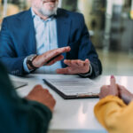 Financial planner in Maitland discussing retirement and investment strategies with clients at Intentional Wealth.